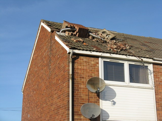 Storm-damaged chimney and ridge tiles in Edinburgh, illustrative example, not Eastern Roofing's work